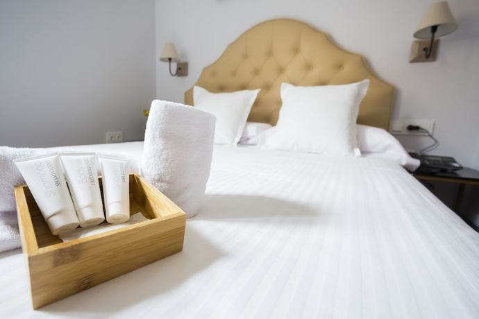 Imagen de la habitación del Apartamentos Casa De La Merced Suites. Foto 2