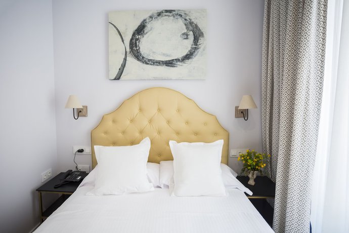 Imagen de la habitación del Apartamentos Casa De La Merced Suites. Foto 3