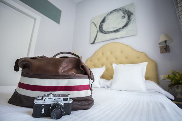 Imagen de la habitación del Apartamentos Casa De La Merced Suites. Foto 4