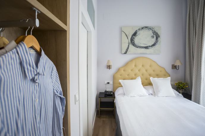 Imagen de la habitación del Apartamentos Casa De La Merced Suites. Foto 5