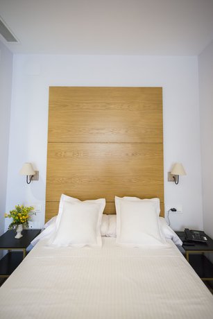 Imagen de la habitación del Apartamentos Casa De La Merced Suites. Foto 7