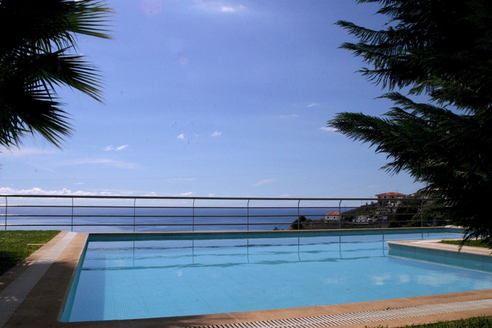 Imagen de la piscina del Apartamentos Casa Do Papagaio Verde. Foto 10