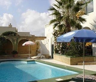 Imagen de la habitación del Apartamentos Casa Patricia Farmhouse. Foto 2