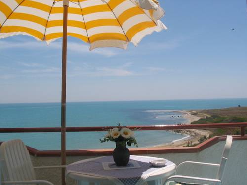 Imagen de la habitación del Apartamentos Case Vacanze Lumia. Foto 10