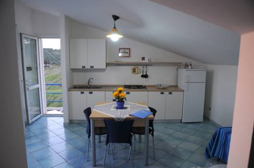 Imagen de la habitación del Apartamentos Case Vacanze Lumia. Foto 12