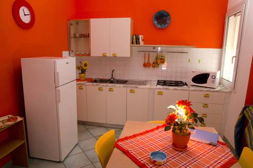 Imagen de la habitación del Apartamentos Case Vacanze Lumia. Foto 15