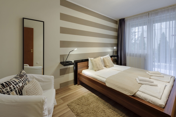 Imagen de la habitación del Apartamentos Central Passage Apartments. Foto 11