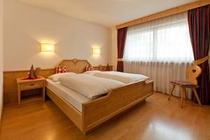 Imagen de la habitación del Apartamentos Chalet Maria. Foto 4