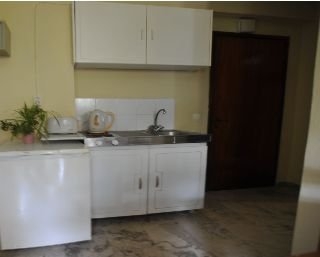 Imagen de la habitación del Apartamentos Charietta Apartments. Foto 4