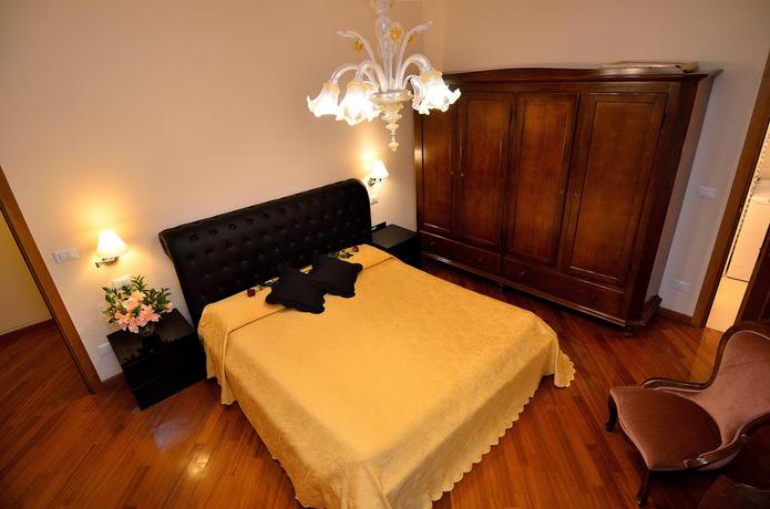 Imagen de la habitación del Apartamentos Charming Venice. Foto 10