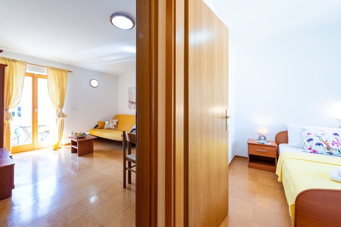 Imagen de la habitación del Apartamentos Cina Apartments. Foto 7
