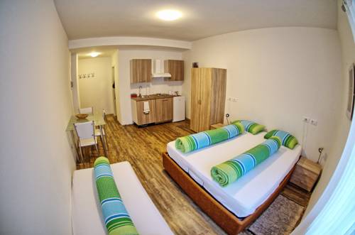 Imagen de la habitación del Apartamentos City Apartments Portico. Foto 3