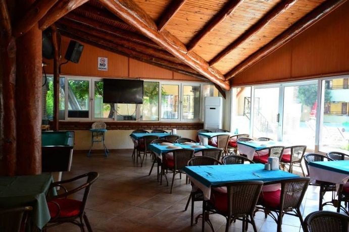 Imagen del bar/restaurante del Apartamentos Club Palm Garden Keskin. Foto 3