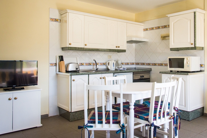 Imagen de la habitación del Apartamentos Club Tarahal. Foto 8