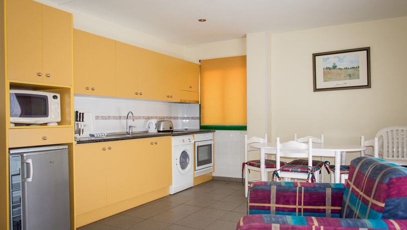 Imagen de la habitación del Apartamentos Club Tarahal. Foto 9