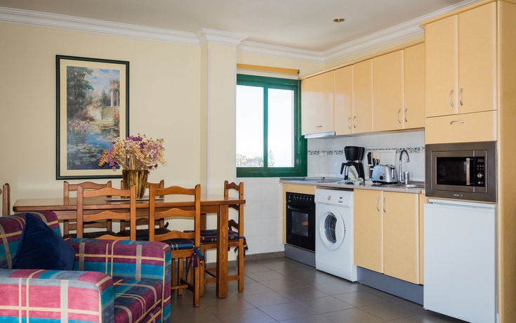 Imagen de la habitación del Apartamentos Club Tarahal. Foto 11