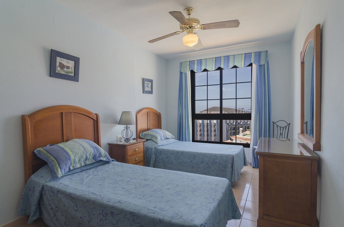 Imagen de la habitación del Apartamentos Club Tenerife. Foto 11