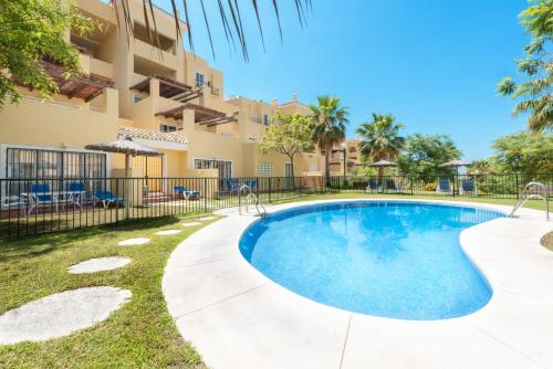 Imagen de la piscina del Apartamentos Colina Del Paraiso by Checkin. Foto 20