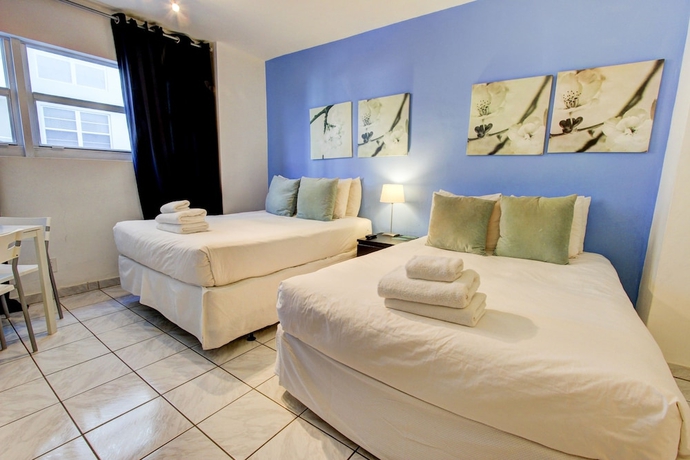 Imagen de la habitación del Apartamentos Collins Apartments By Design Suites. Foto 9