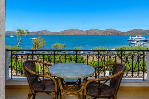 Imagen de la habitación del Apartamentos Corali Studios & Portobello. Foto 2