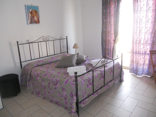 Imagen de la habitación del Apartamentos Coralli Di Mare. Foto 2
