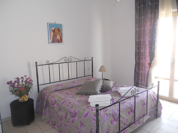 Imagen de la habitación del Apartamentos Coralli Di Mare. Foto 6