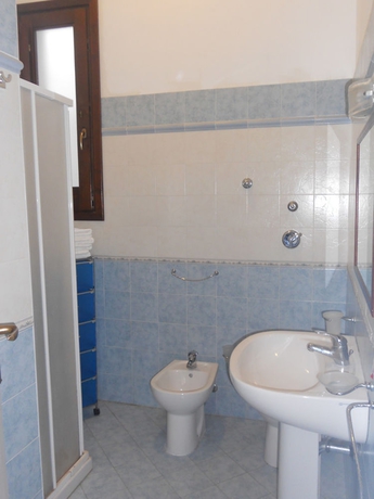 Imagen de la habitación del Apartamentos Coralli Di Mare. Foto 11
