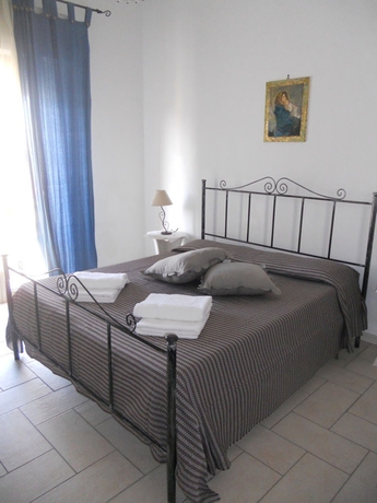 Imagen de la habitación del Apartamentos Coralli Di Mare. Foto 12
