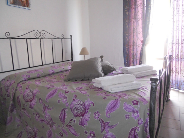 Imagen de la habitación del Apartamentos Coralli Di Mare. Foto 15