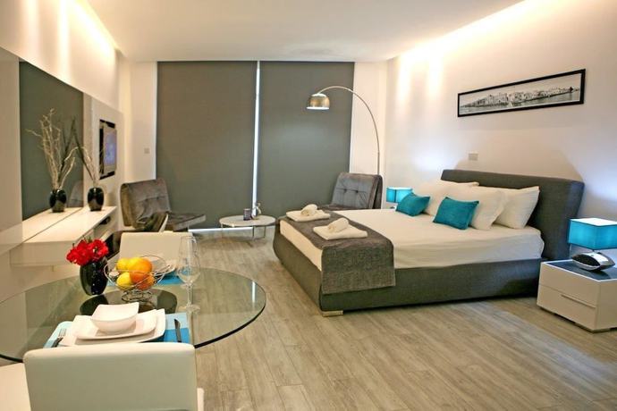 Imagen de la habitación del Apartamentos Corina Suites. Foto 8