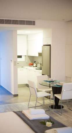 Imagen de la habitación del Apartamentos Corina Suites. Foto 11