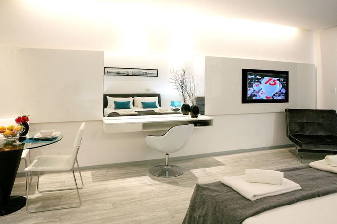 Imagen de la habitación del Apartamentos Corina Suites. Foto 14