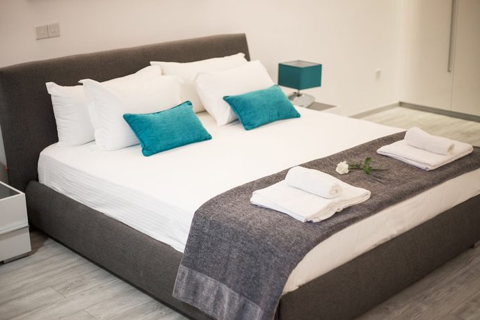 Imagen de la habitación del Apartamentos Corina Suites. Foto 18
