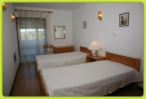 Imagen de la habitación del Apartamentos Curia Clube Apartments. Foto 3