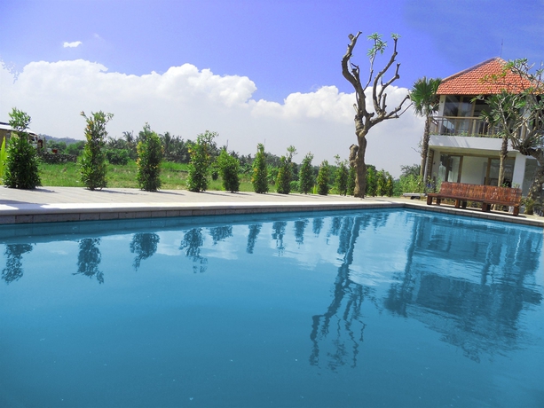 Imagen de la piscina del Apartamentos D'sawah Villas. Foto 14