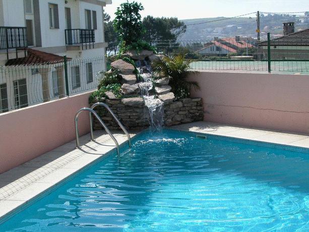 Imagen de la piscina del Apartamentos Duerming Velero Apartamentos. Foto 10