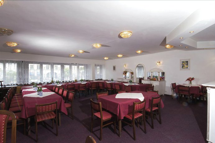 Imagen del bar/restaurante del Apartamentos Ea Apartmány Mozart. Foto 4