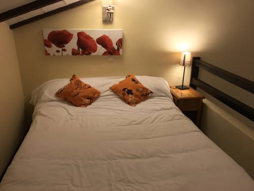 Imagen de la habitación del Apartamentos El Bulin de Robregordo. Foto 14