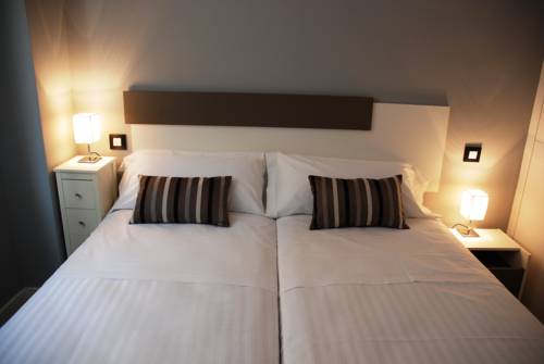 Imagen de la habitación del Apartamentos El Capricho De Madrid. Foto 15