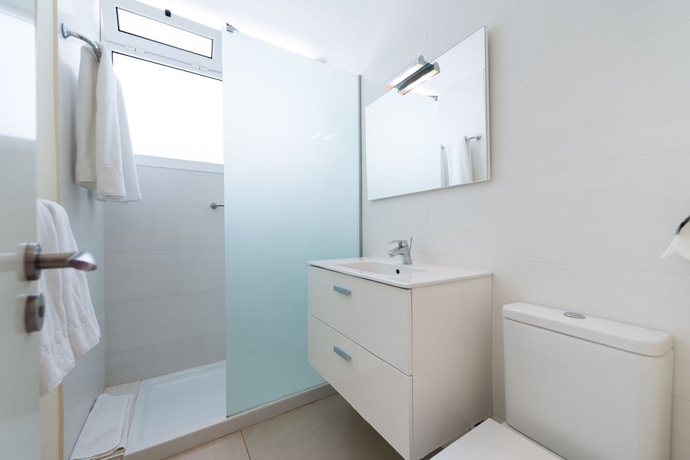 Imagen de la habitación del Apartamentos El Capricho. Foto 12