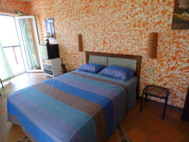 Imagen de la habitación del Apartamentos El Faro Apartment. Foto 5