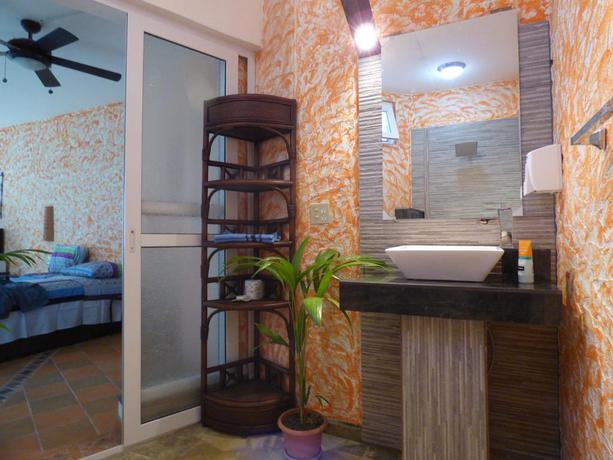 Imagen de la habitación del Apartamentos El Faro Apartment. Foto 10