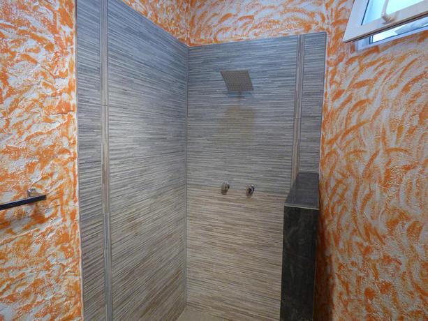 Imagen de la habitación del Apartamentos El Faro Apartment. Foto 12