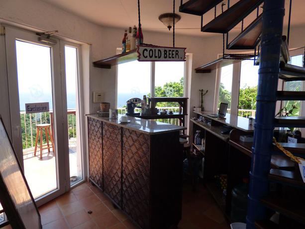 Imagen del bar/restaurante del Apartamentos El Faro Apartment. Foto 3