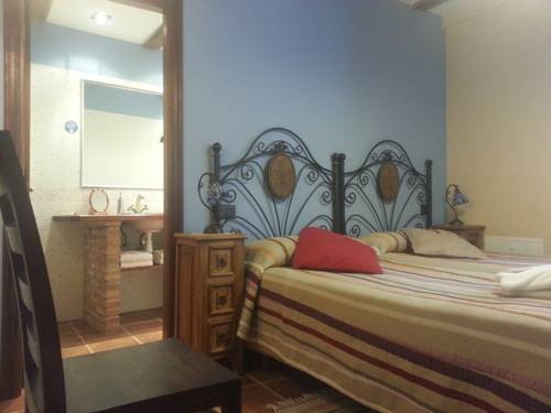 Imagen de la habitación del Apartamentos El Horno De Aliaga. Foto 4