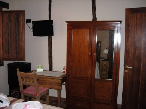 Imagen de la habitación del Apartamentos El Horno De Aliaga. Foto 5