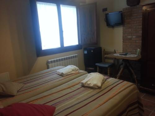 Imagen de la habitación del Apartamentos El Horno De Aliaga. Foto 8