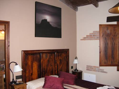 Imagen de la habitación del Apartamentos El Horno De Aliaga. Foto 9