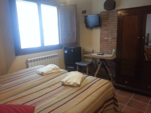 Imagen de la habitación del Apartamentos El Horno De Aliaga. Foto 11