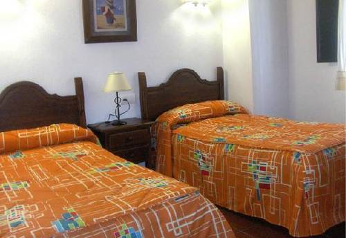 Imagen de la habitación del Apartamentos El Molino de La Quinta. Foto 3